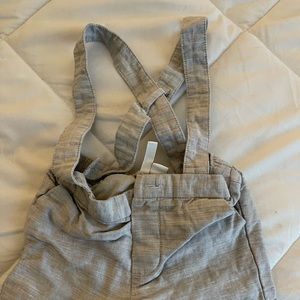 Grey linen Janie and Jack shorts with suspenders.